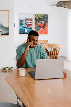 Digital nomad taking a business call from a rented house