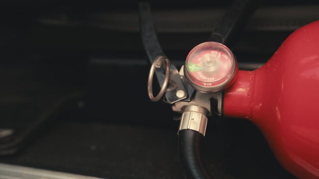 Close-up of a fire extinguisher pressure gauge