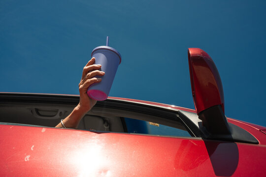 Drink Raised From Car