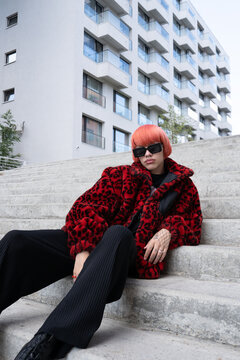 Edgy Gen Z Guy with Orange Mullet in Red Leopard Print Fur Coat