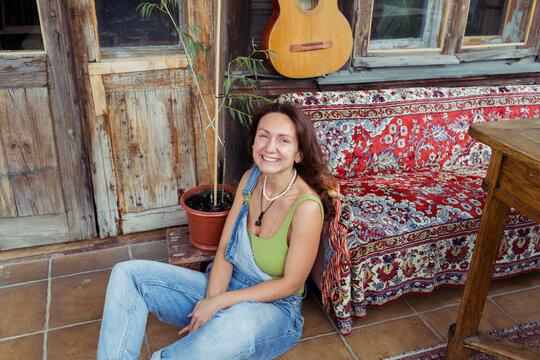 A woman spends time in her furniture restoration studio