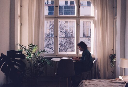 Young Woman Working on Laptop 
