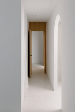 Minimalist white hallway in a contemporary home
