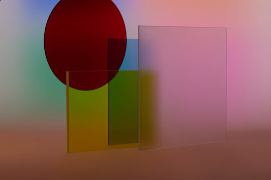 Abstract composition with translucent geometric shapes and a dark