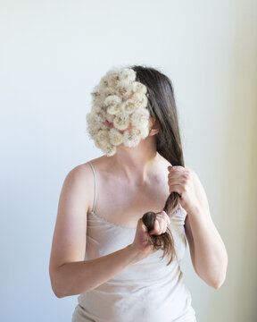 Woman with dandelions on her face 13