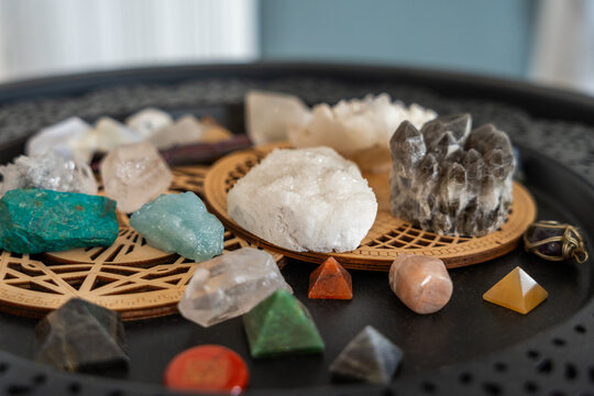 Colorful Collection of Crystals and Stones on a Decorative Tray