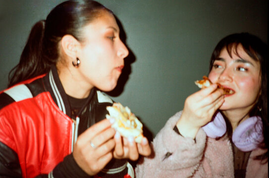 Friends Eating Pizza Together