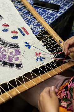 Female artisan creating product for local business