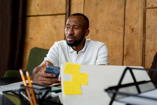 Portrait of a black male office employee