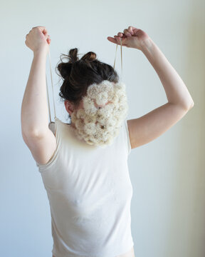Woman with dandelions on her face 5