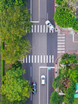 Aerial City Intersection with Crosswalks and Cars