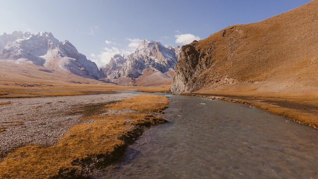 Mountain Landscape with River and Snowy Peaks in Kyrgyzstan Tien Shan