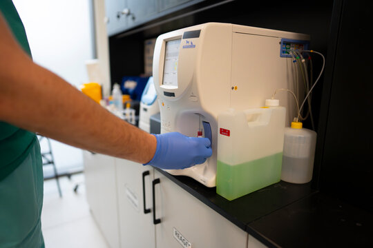 Tech testing samples in the lab
