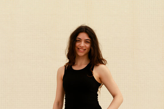Woman Poses in Black Outfit 