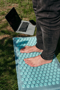 Relaxing Outdoors With a Laptop on a Sunny Day
