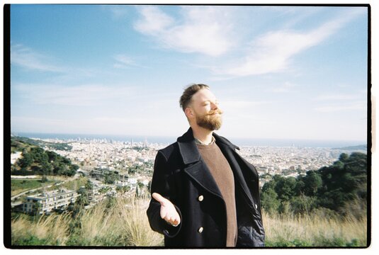 Man Enjoys the View Over Barcelona