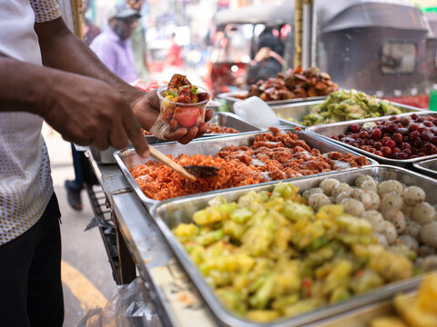Street Vendor Serves Various Acharharu at Colombo street market