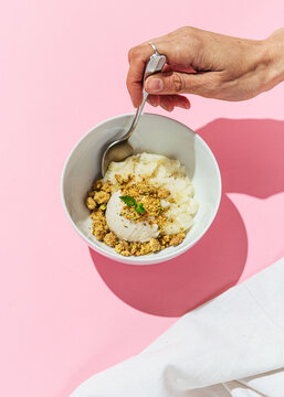 Delicious bowl of vegan sorbet with ice cream and crumble