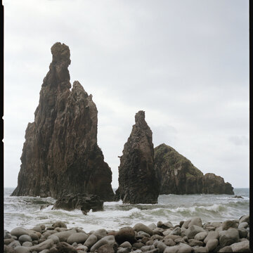 Volcanic sea stacks on rocky beach Madeira