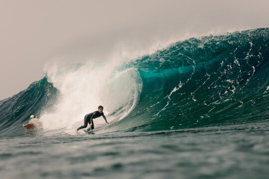 A seasoned surfer trains offshore near the Lanzarote coastline