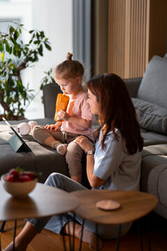 Using tablet during snack time
