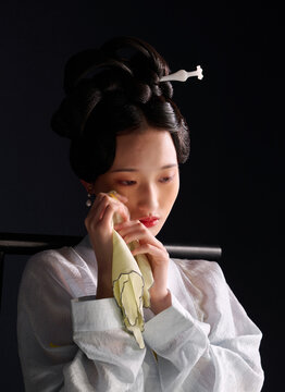 A portrait of a woman dressed in traditional Chinese Hanfu 