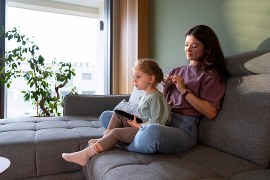 Mother and child relax at home