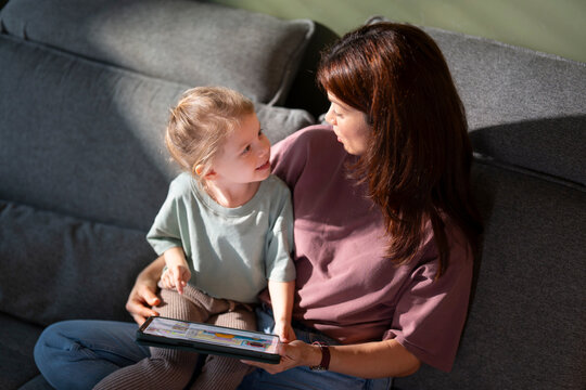 Mother and child sharing a moment together indoors