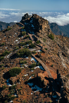 Rocky ridge above clouds at Roque de los Muchachos, La Palma