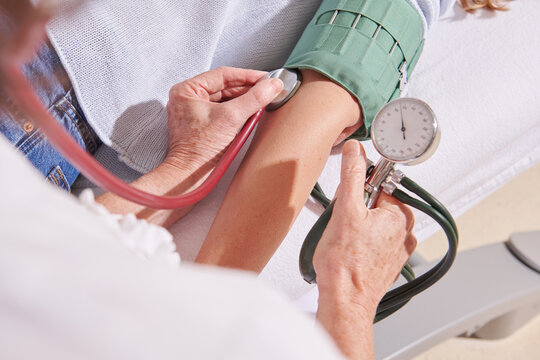 Close-Up of Blood Pressure Measurement Procedure