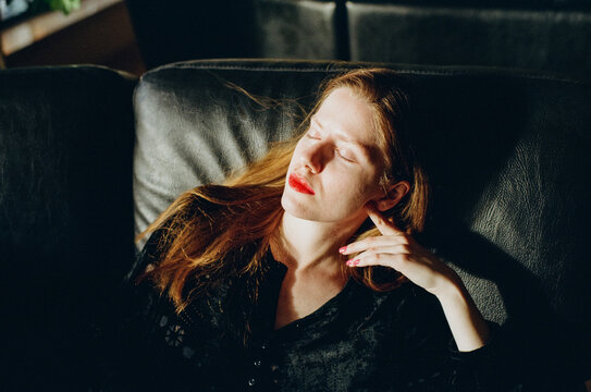 Young woman on the sofa