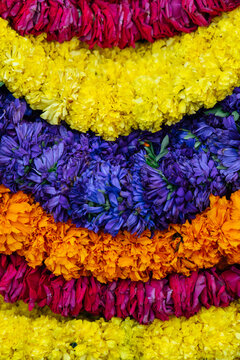 Vibrant multicolored flower garlands