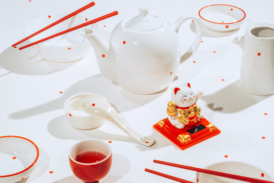 tea ceremony with "beckoning cat"