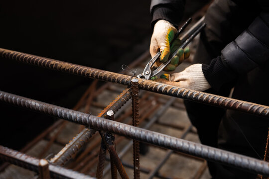 Tying rebar with pliers