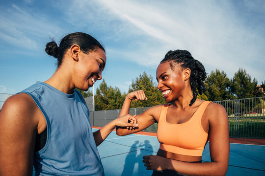 Outdoor fitness joy and friendship between two women