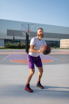 Adult male athlete playing streetball