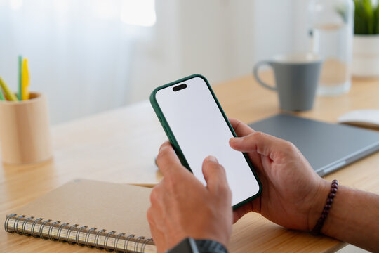 Hands Using Smartphone with Blank Screen