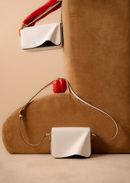 White Handbag with Red Pepper Accent