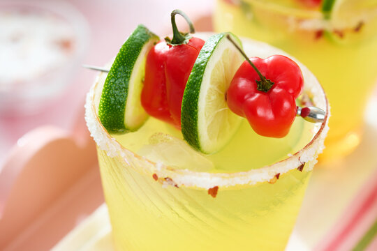 Closeup  of Ice Cold Margaritas wit Hot Peppers