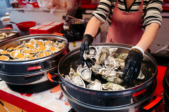 Delicious Seafood Delights at Vibrant Street Market During Daytime