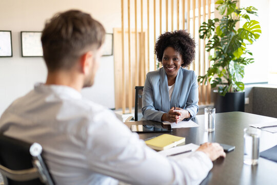 Diverse businesspeople talking during job interview