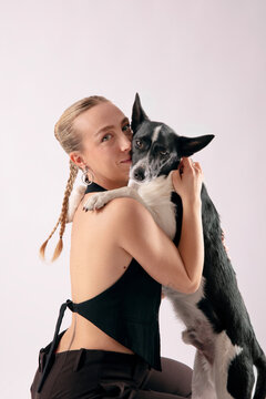 Woman Hugging Dog