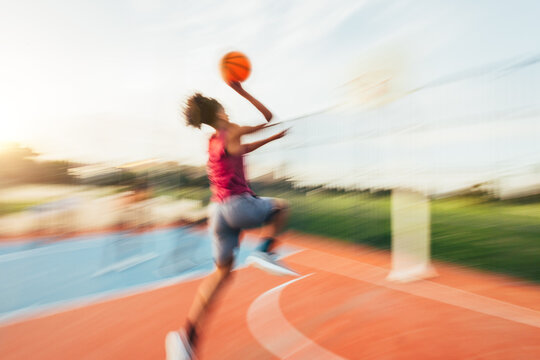 Basketball player in motion during a fast-paced game