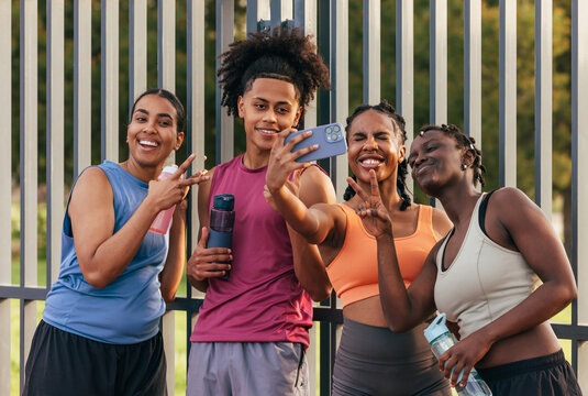 Friends taking a selfie after an outdoor workout