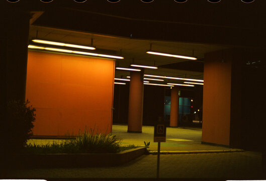 Empty covered walkway at night