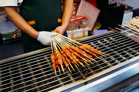 Freshly Grilled Skewers Create Mouthwatering Aromas at the Market