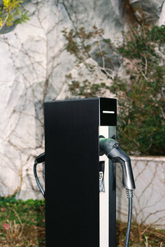 Electric vehicle charge station at the street.
