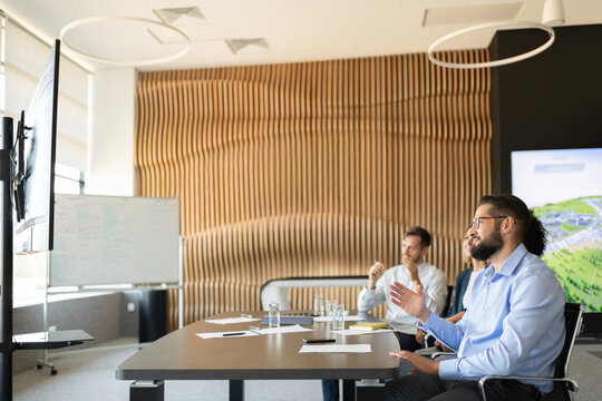 Businesspeople having video conference in office
