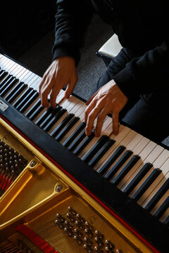 Pianist hands top view during a piano practice