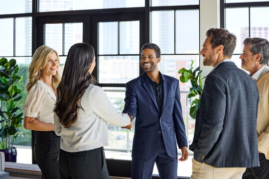 Business handshake in Hotel Lounge